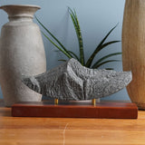 Small hand-carved stone sculpture of Swiftcurrent Mountain