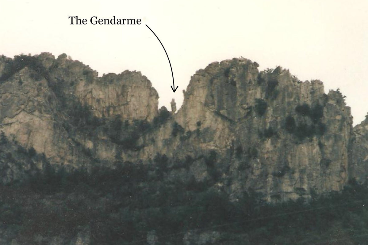 Seneca Rocks in 1985, with the Gendarme standing in the notch. Photo by Earl Pappas