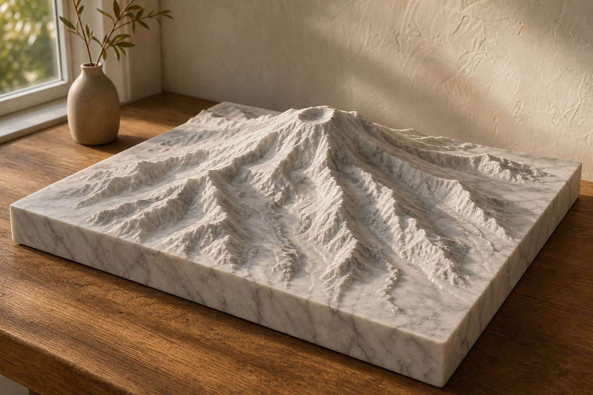 Illustrative mockup: a white marble topographic map of Mount Rainier on an oak table